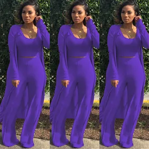 Detailed view of the purple three-piece ribbed knit outfit with cardigan and wide-leg pants