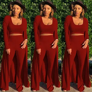 Triple-view detail of a sexy deep red ribbed 3-piece set with long cardigan and pants
