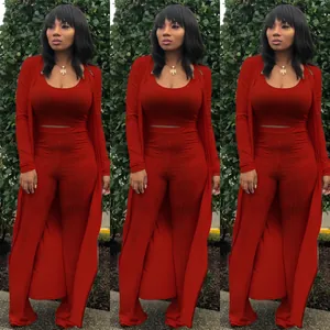 Three views of a women's red 3-piece ribbed knit crop top and pants set with cardigan.