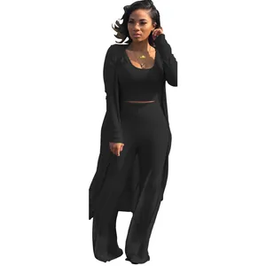 Sexy full view of black 3-piece ribbed set with crop top, wide-leg pants and cardigan