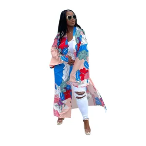 Full-length fashion view of a women's autumn casual floral print kimono cardigan.
