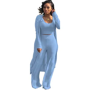 Light blue ribbed three-piece set featuring long cardigan, crop top, and wide-leg pants