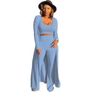 Elegant sky blue three-piece ribbed lounge set featuring long cardigan and crop top