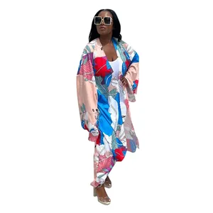 Detailed view of stylish women's vibrant tropical floral print long sleeve kimono set