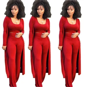 Sexy red three-piece ribbed knit set featuring crop top high-waist pants and long cardigan
