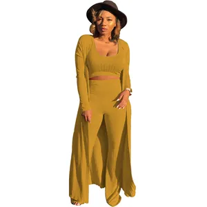 Detailed view of women's mustard yellow ribbed high-stretch 3-piece outfit set.