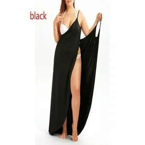 Detailed macro view showing the fabric and wrap design of a sexy black V-neck dress