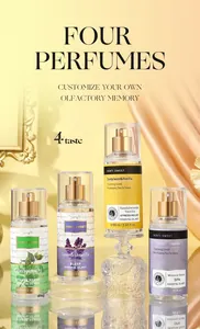 Detailed view of four essential oil body mist sprays on elegant glass pedestals