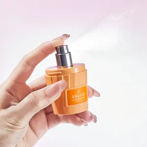 Long-lasting sweet ice cream shaped mini perfume spray for women, 50ml bottle in use.