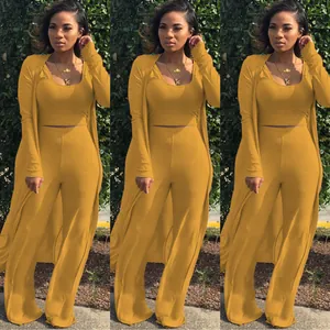 Stylish mustard yellow women's 3-piece ribbed set with crop top, pants, and long cardigan