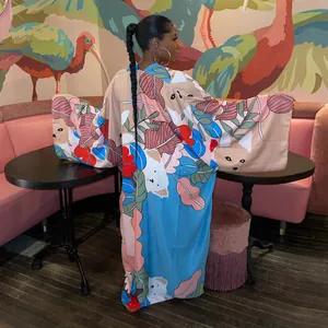 Detailed view of women's colorful floral printed long kimono cardigan with loose fit
