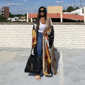 Women's stylish long floral print kimono cardigan with vibrant abstract patterns