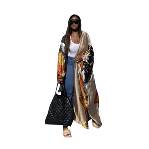 Full view of bohemian printed long kimono robe with loose sleeves and vibrant abstract design
