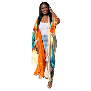 Vibrant orange and blue floral print long kimono cardigan for a stylish autumn look