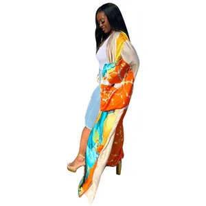 Elegant long-sleeved casual kimono outerwear featuring a vibrant abstract floral print for women