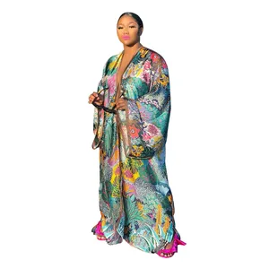 Full-length view of the vibrant floral print kimono robe showing its flowy loose fit
