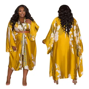 Front and back view of long-sleeved floral satin kimono robe with elegant belt detail.