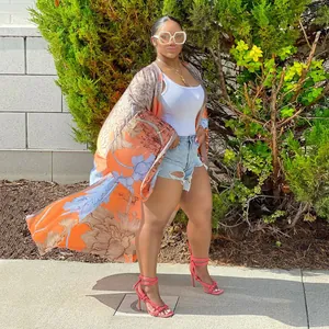 Stylish long floral print kimono cardigan for women in vibrant orange with loose casual fit.