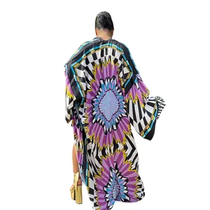 Detailed back view of a vibrant geometric mandala print loose long sleeve maxi kimono cardigan