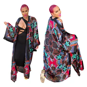 Detailed view of women's long printed kimono cardigan with bohemian floral patterns