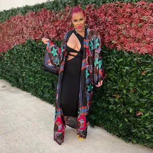 Detailed view of women's colorful floral print kimono cardigan with long sleeves