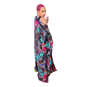 Vibrant bohemian floral printed long kimono cardigan with loose fit shown on model
