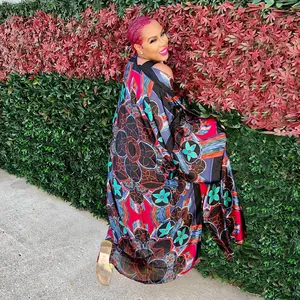 Stylish women's long sleeve kimono windbreaker with vibrant geometric prints for fall fashion.