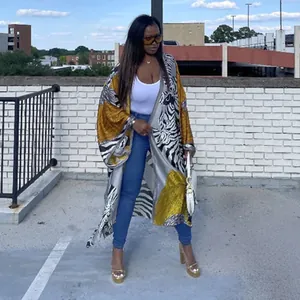 Casual long-sleeved kimono cardigan with bold animal and color-block print patterns.