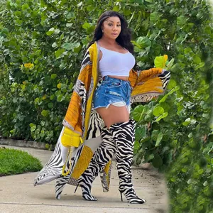 Full-length outdoor styling of an autumn printed loose casual kimono windbreaker
