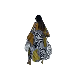 Back view of a loose autumn kimono cardigan featuring bold zebra and geometric patterns