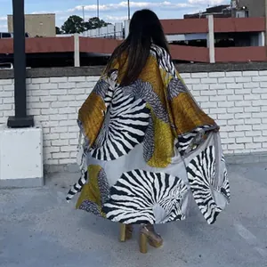 Detailed back view of a long zebra print kimono windbreaker with loose casual fit