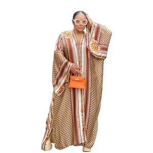 Detailed view of the stylish printed loose-fitting kimono maxi dress with buckle patterns