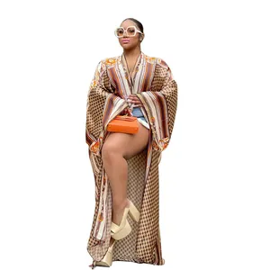 Detailed view of women's bohemian printed long kimono cardigan with chain patterns
