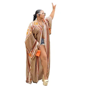 Elegant long-sleeved kimono cardigan featuring a vintage chain and geometric print design.