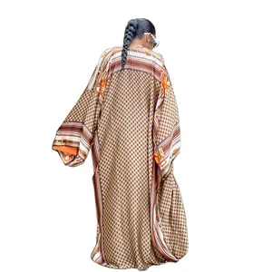 Detailed back view of a bohemian printed long kimono cardigan with geometric chain pattern