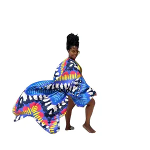 Vibrant butterfly print kimono cover-up with loose sleeves, shown on a female model.