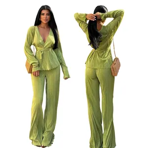 Professional front and back view of a women's green pleated two-piece long sleeve wrap set