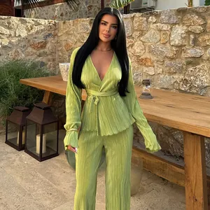 Chic lime green pleated two-piece set with long sleeve wrap top and wide leg pants