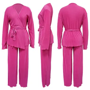 Three-angle detail view of hot pink pleated long-sleeve top and wide-leg trousers set