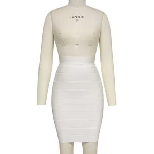 Detail view of a white high-waisted bandage bodycon mini skirt on a mannequin.