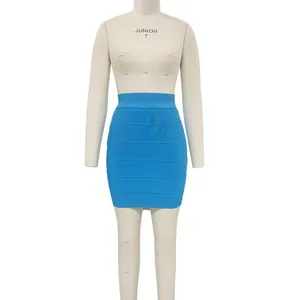 Front view of a vibrant blue bandage mini skirt displayed on a professional white dress form