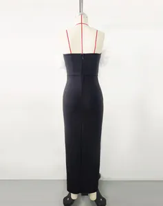 Elegant black bandage maxi dress with white feather shoulder details and back zipper