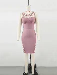 Detail of sexy mauve bodycon bandage dress with criss-cross neck and side cutouts