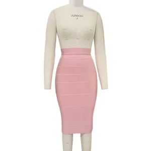 High-waist pink bodycon bandage midi skirt detail view on professional white mannequin.
