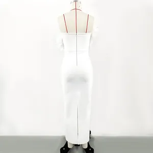 Elegant white bandage maxi dress with back zipper and hem slit detail on mannequin