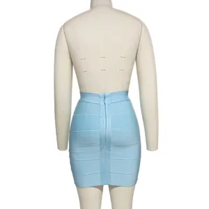 Back view of a light blue bandage bodycon mini skirt displayed on a white mannequin