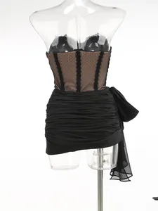 Detailed back view of sexy strapless corset dress with black lace and ruched fabric