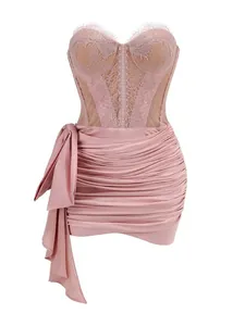 Elegant pink lace corset mini dress with ruched satin skirt and side drape detail