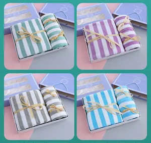 Premium striped towel gift set showing green, purple, gray and blue color options
