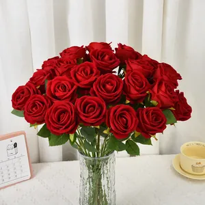Detailed view of red artificial velvet roses for wedding and festive home decoration